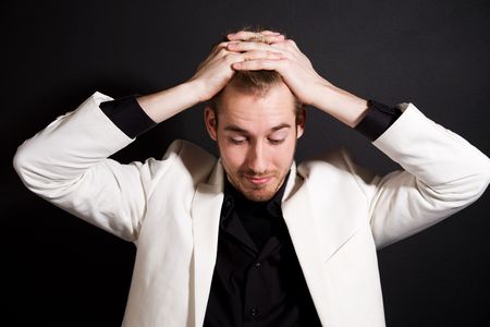 A shot of a stressed casual caucasian businessmanの写真素材