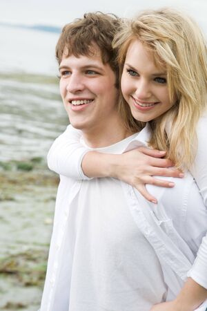 A shot of a caucasian couple on the beachの写真素材