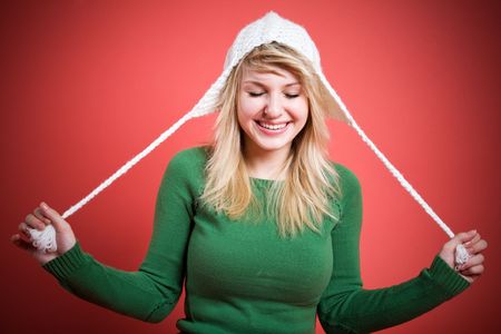 A happy caucasian girl in winter fashion outfit