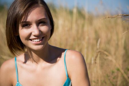 A fashion shot of a happy beautiful caucasian girlの写真素材