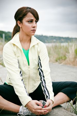 A beautiful asian woman exercises in a parkの写真素材