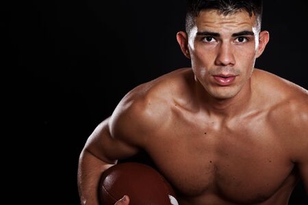 A portrait of a hispanic american football playerの写真素材