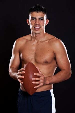 A portrait of a hispanic american football playerの写真素材