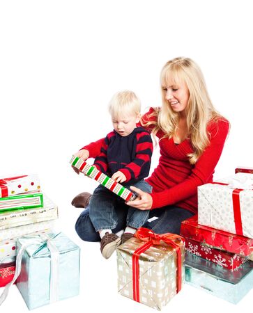 A caucasian mother and son opening christmas giftsの写真素材