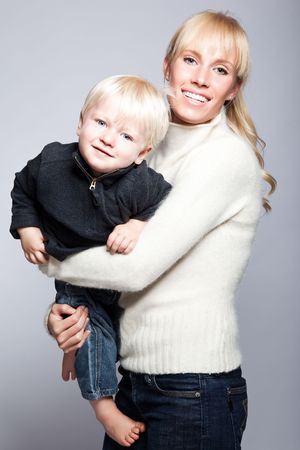 A portrait of a happy caucasian mother with her sonの写真素材