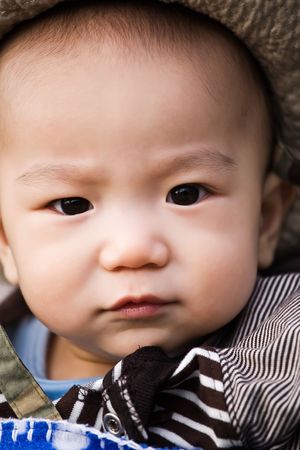 A portrait of a cute asian babyの写真素材