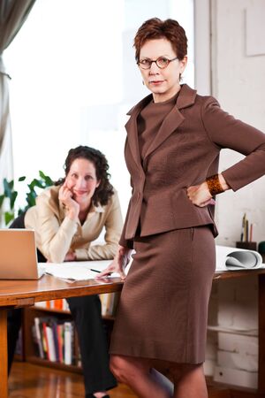 A shot of two businesswomen working in the officeの写真素材