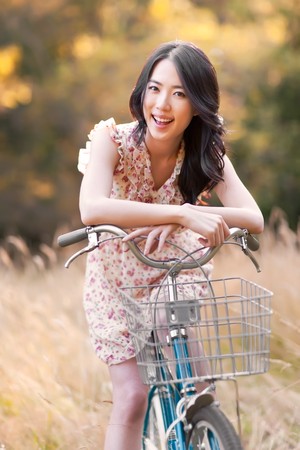 A portrait of a beautiful asian woman outdoorの写真素材