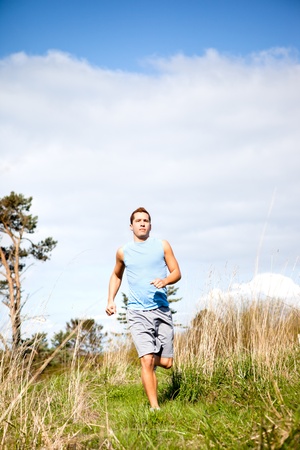 A shot of a mixed race man running outdoorの写真素材