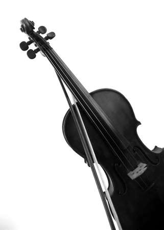 A violin with bow on a white backgroundの写真素材
