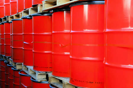 Assembly of red oil drums on palettesの写真素材