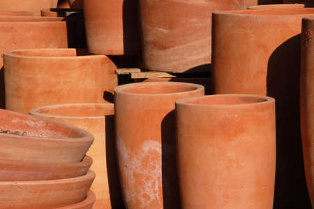Collection of clay flower pots in a pottery