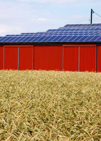 Solar energy panel on a rural buildingの写真素材