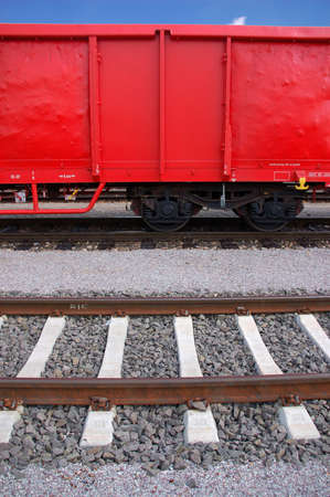 Red train lorry on a railroad