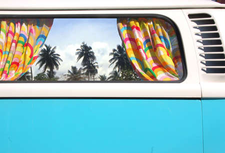 Automobile bus with a view on palmsの写真素材