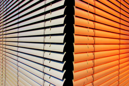 Closeup of two shutters at an office buildingの写真素材