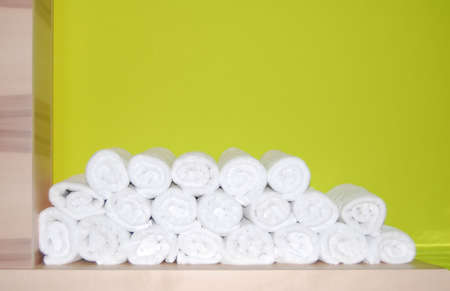 Folded towels in a spaの写真素材