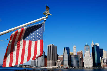 American flag and eagle with Manahttan skylineの写真素材