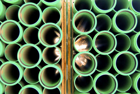 Green pipes on a erection siteの写真素材