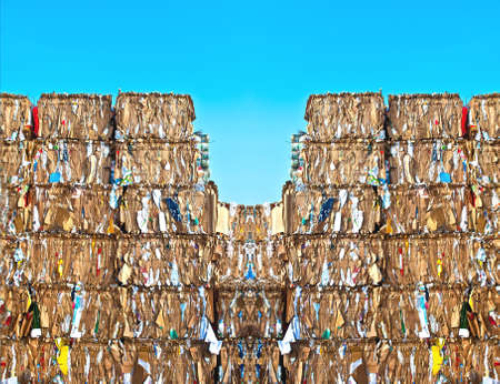 Pile of paper on a  recycling siteの写真素材