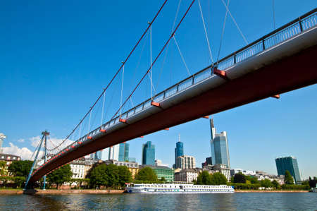 Bridge across the Main in Frankfurt city in Germanyの写真素材