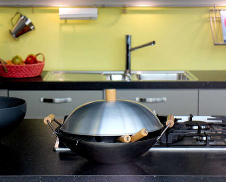 Modern kitchen with a gas oven and a wokのeditorial素材