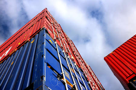 Blue and red container viewed from below の写真素材