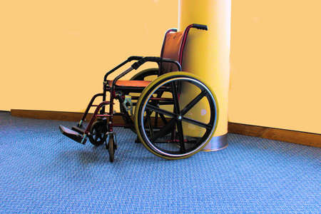 Wheel chair on the floor of a hospitalの写真素材