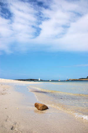 Long beach, sailing boats and a blue skyの写真素材