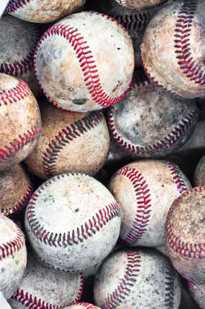 Assembly of many vintage white baseballs with red seamsの写真素材