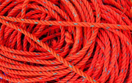Red rope of a fishing boatの写真素材