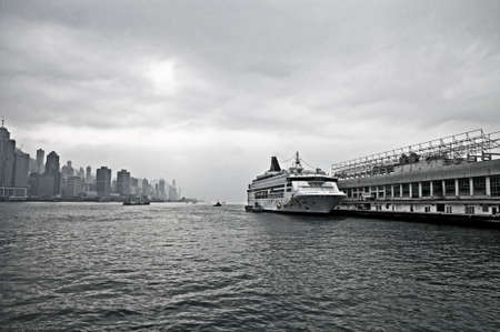 Hong Kong harbor with skyscraper and cruise shipの写真素材