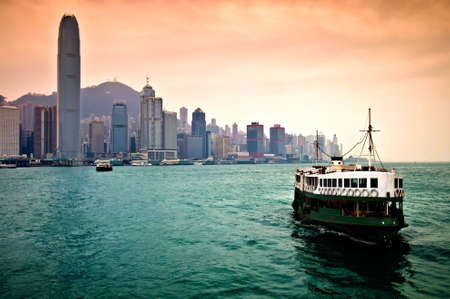 Hong Kong Island skyscraper with ferry boatの写真素材