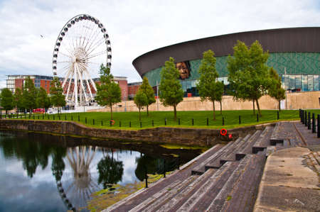Ferris wheel and Echo Arena in Liverpoolのeditorial素材