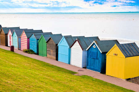 Colorful diagonal line of beach huts in Englandの写真素材