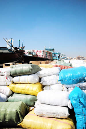 Freight loading on a ship in the harbour of Dubai