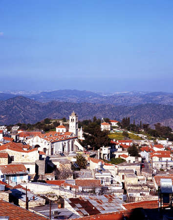 View over the town rooftops towards the mountains, Lefkara, Cyprusの写真素材