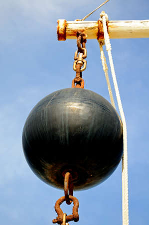 Black navigation depth gauge ball at the harbour entrance, Puerto Cabopino, Costa del Sol, Malaga Province, Andalucia, Spain, Western Europe の写真素材