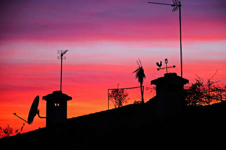 Mediterranean sunset over house rooftops, Costa del Sol, Malaga Province, Andalucia, Spain, Western Europe の写真素材