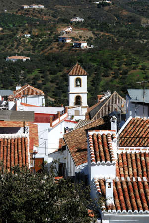 View over town rooftops towards the mountains, Guaro, Malaga Province, Andalusia, Spain, Western Europe の写真素材