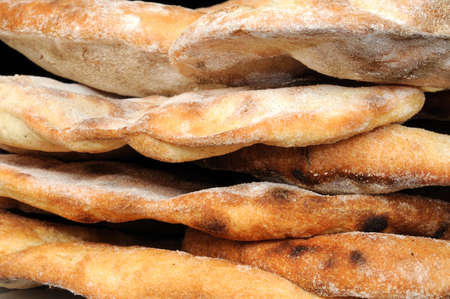 Freshly cooked coriander and garlic Naan bread.の写真素材