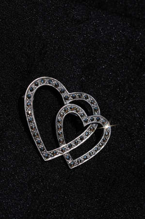 Sterling silver heart brooch with Marcasite stones, England, UK, Western Europe.の写真素材