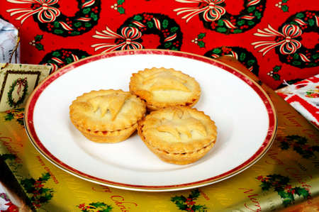 Homemade mince pies and wrapped Christmas presents, England, UK, Western Europe 