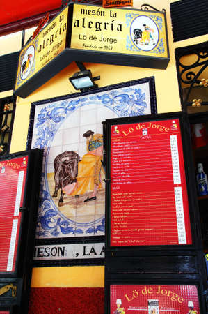 Malaga, Spain - June 14, 2011 - Tapas Bar menu and ceramic bullfighting picture, Malaga, Costa del Sol, Malaga Province, Andalucia, Spain, Western Europe のeditorial素材