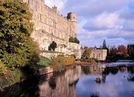 Warwick castle alongside the river Avon, Warwick, Warwickshire, England, UK, Western Europe のeditorial素材