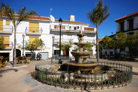 Colmenar, Spain - February 13, 2009 - Fountain and pavement cafes in the town square, Colmenar, Andalusia, Spain, Western Europe のeditorial素材