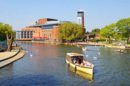 Stratford-upon-Avon, UK - May 18, 2014 - Royal Shakespeare Company Theatre along the River Avon, Stratford-Upon-Avon, Warwickshire, England, United Kingdom, Western Europe のeditorial素材
