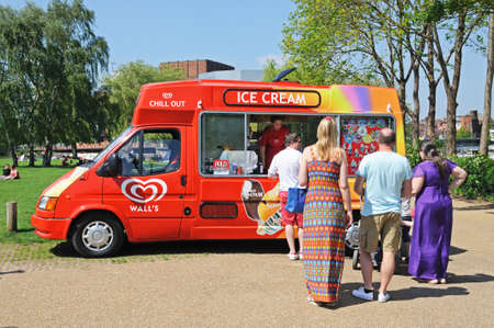 Stratford-upon-Avon, UK - May 18, 2014 - People buying ice creams from an ice cream van, Stratford-Upon-Avon, Warwickshire, England, Western Europe のeditorial素材