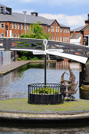 BIRMINGHAM, UK - MAY 14, 2014 - Fingerpost on an island in the centre of the canal, Old Turn junction, Birmingham, West Midlands, England, UK, Western Europe のeditorial素材