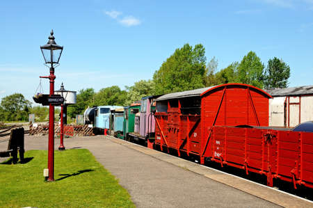 Brownhills West, United Kingdom - May 17, 2014 - Small diesel engines and colourful wagons, Brownhills West Railway Station, Staffordshire, England, UK, Western Europe のeditorial素材